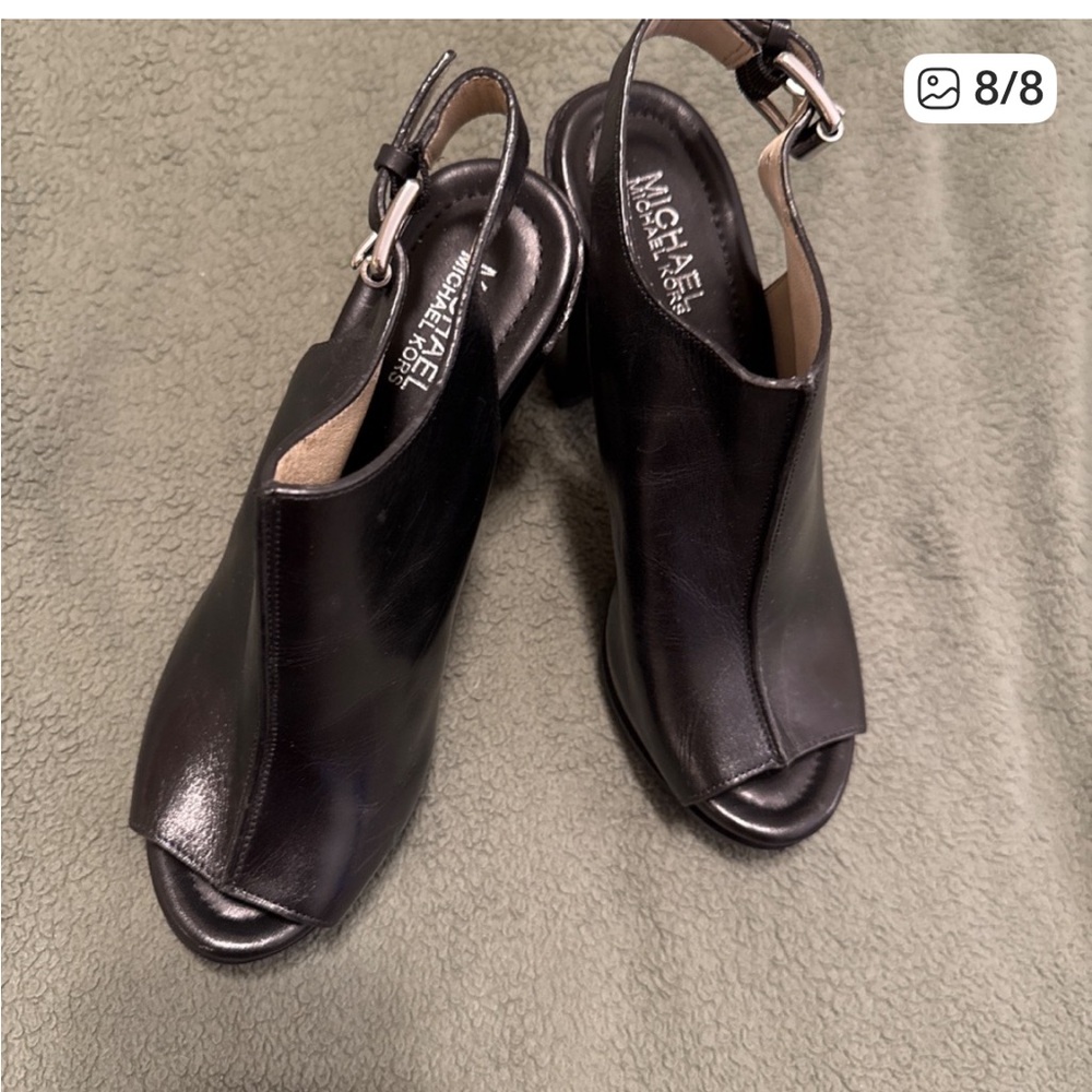 Gorgeous pair of Michael Kors sling back leather platform heels